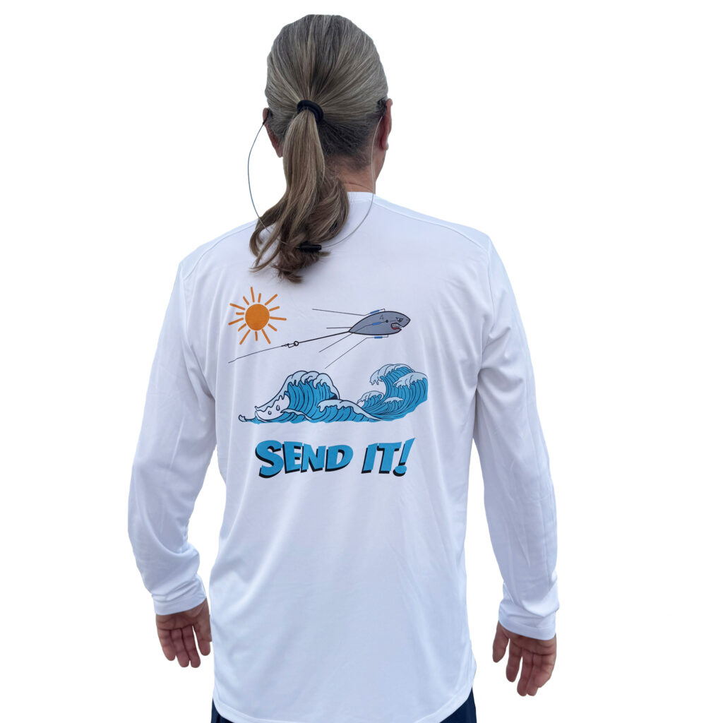 Featured Dorman wearing a Sport-tec performance Tee back view on the beach