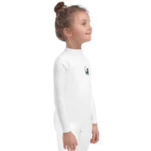 Small Child Wearing a Kid's Rash Guard with Obi Surf Casting Design White Color
