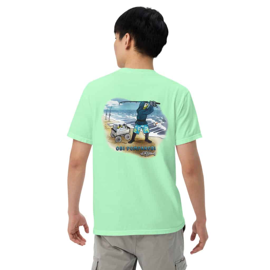 Man wearing Obi Pompanobi Fishing Beach Scene Design Island Reef color T-shirt